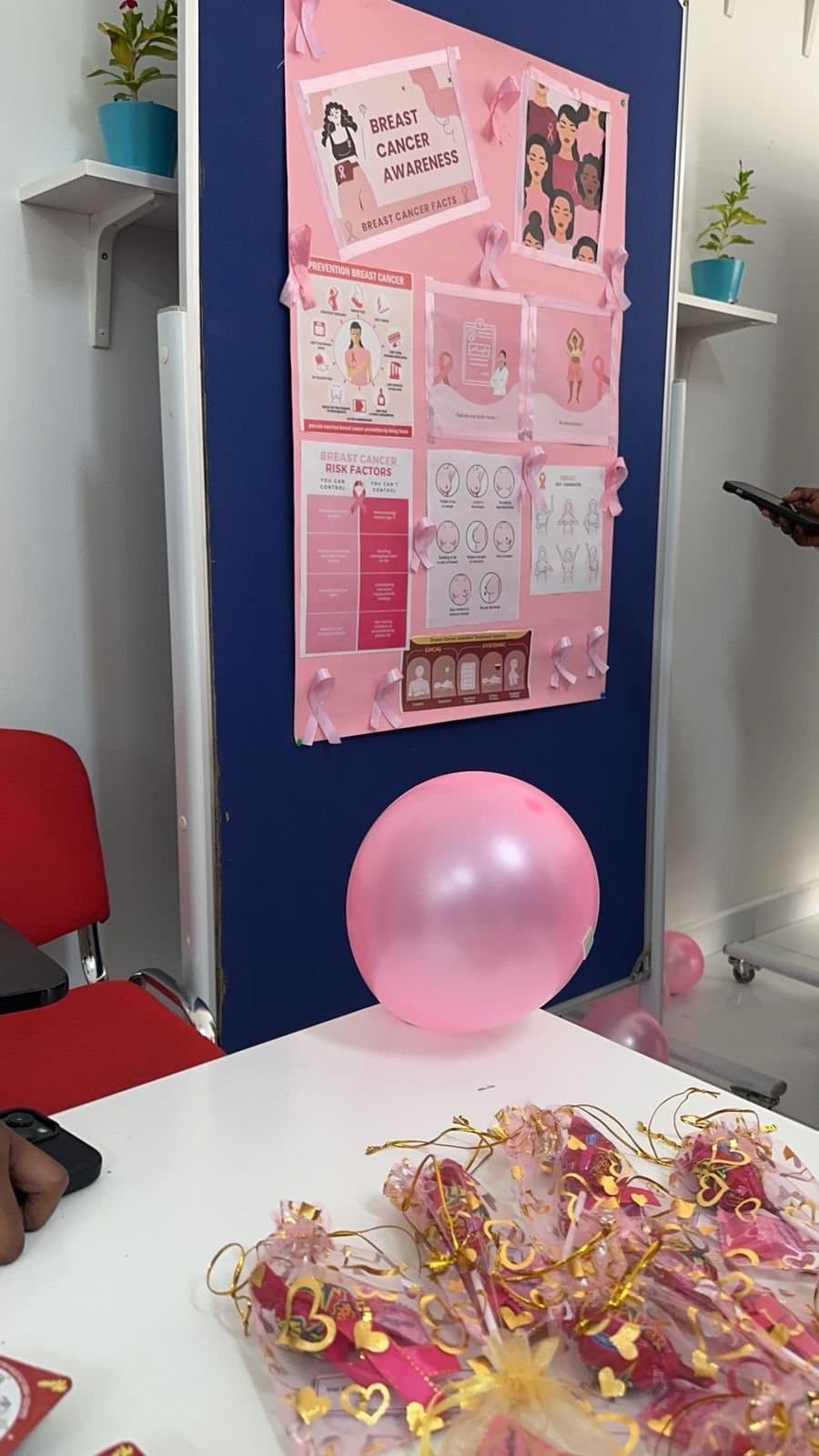 Breast cancer awareness education board displayed during Pinktober 2023 at Gulf Medical University