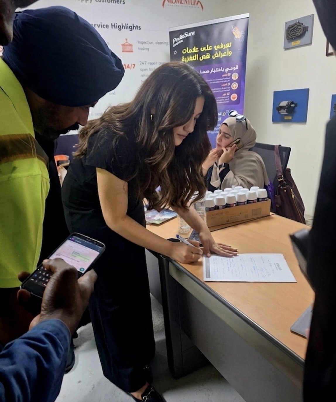 Health education and screening desk at the GoTriage Sharjah Container Terminal camp