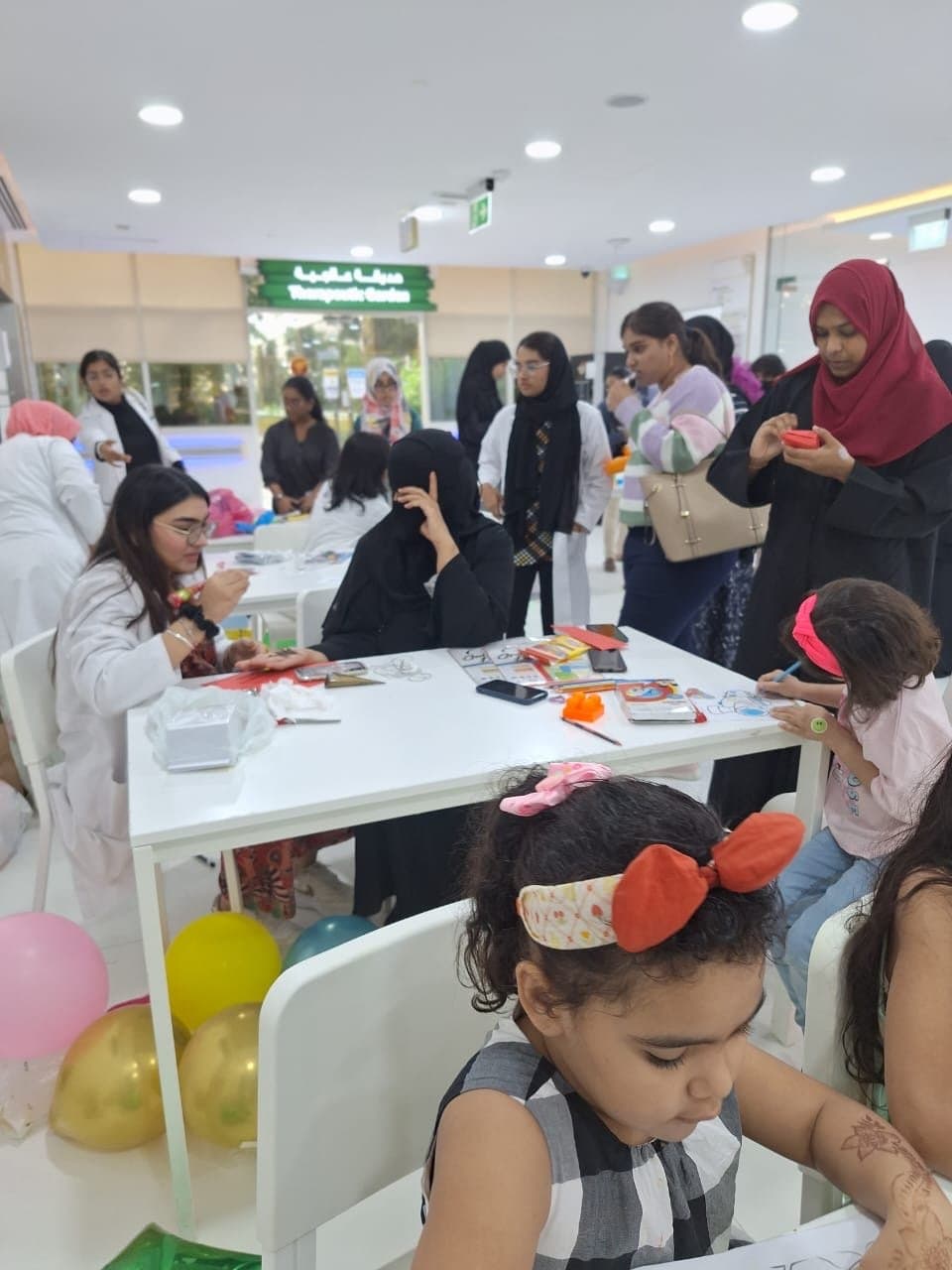 Volunteer group at the pediatric patient engagement activity in a hospital garden