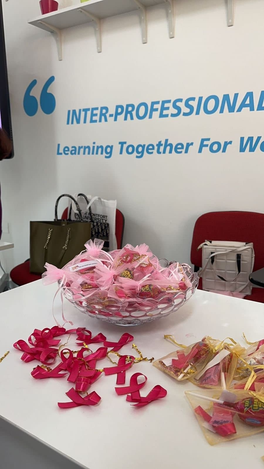 Pink ribbon materials prepared for the Pinktober 2023 community engagement event