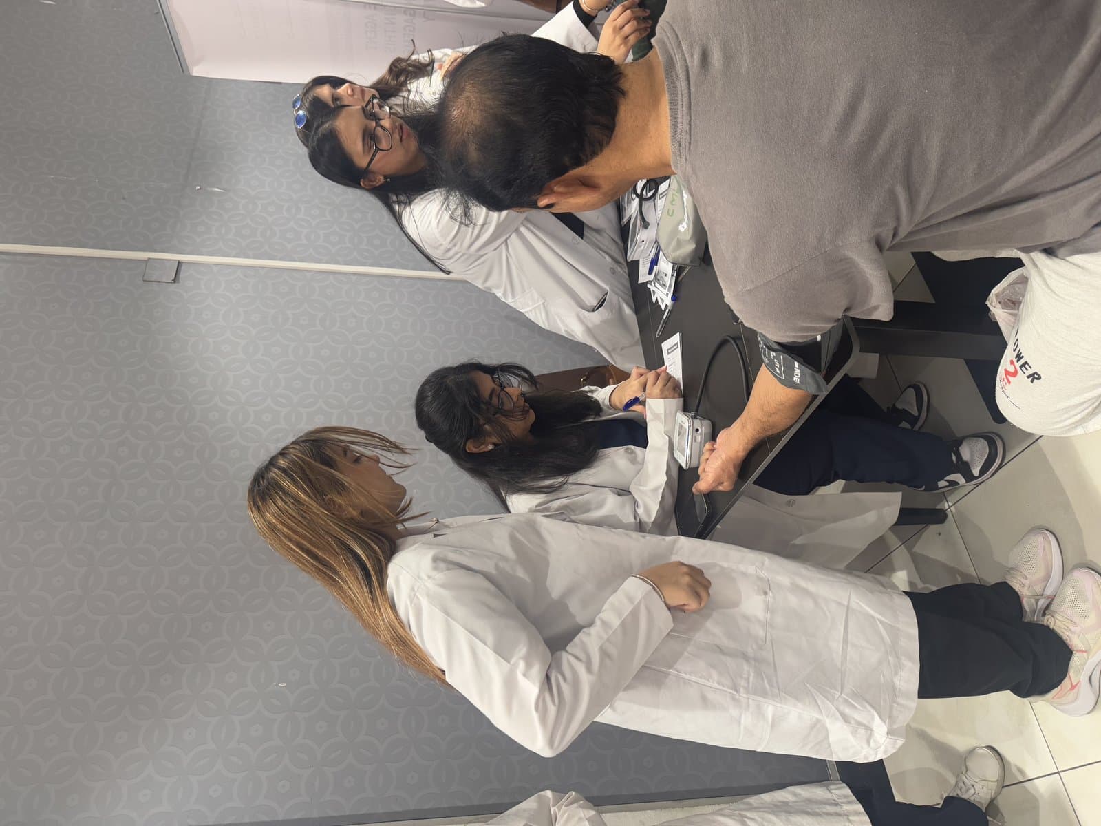 Gulf Medical University World Health Day screening team and education table